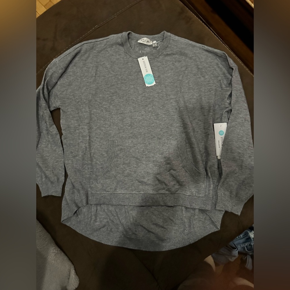 Women’s medium RD Style sweater.  We with tags.